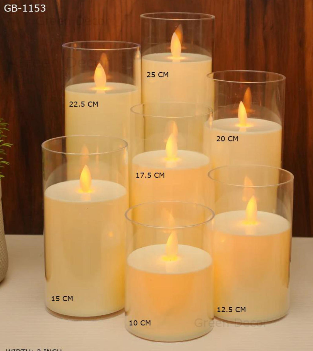 Set of seven pillar flickering candles with measurements on a white surface Ginni Bloom Mumbai India